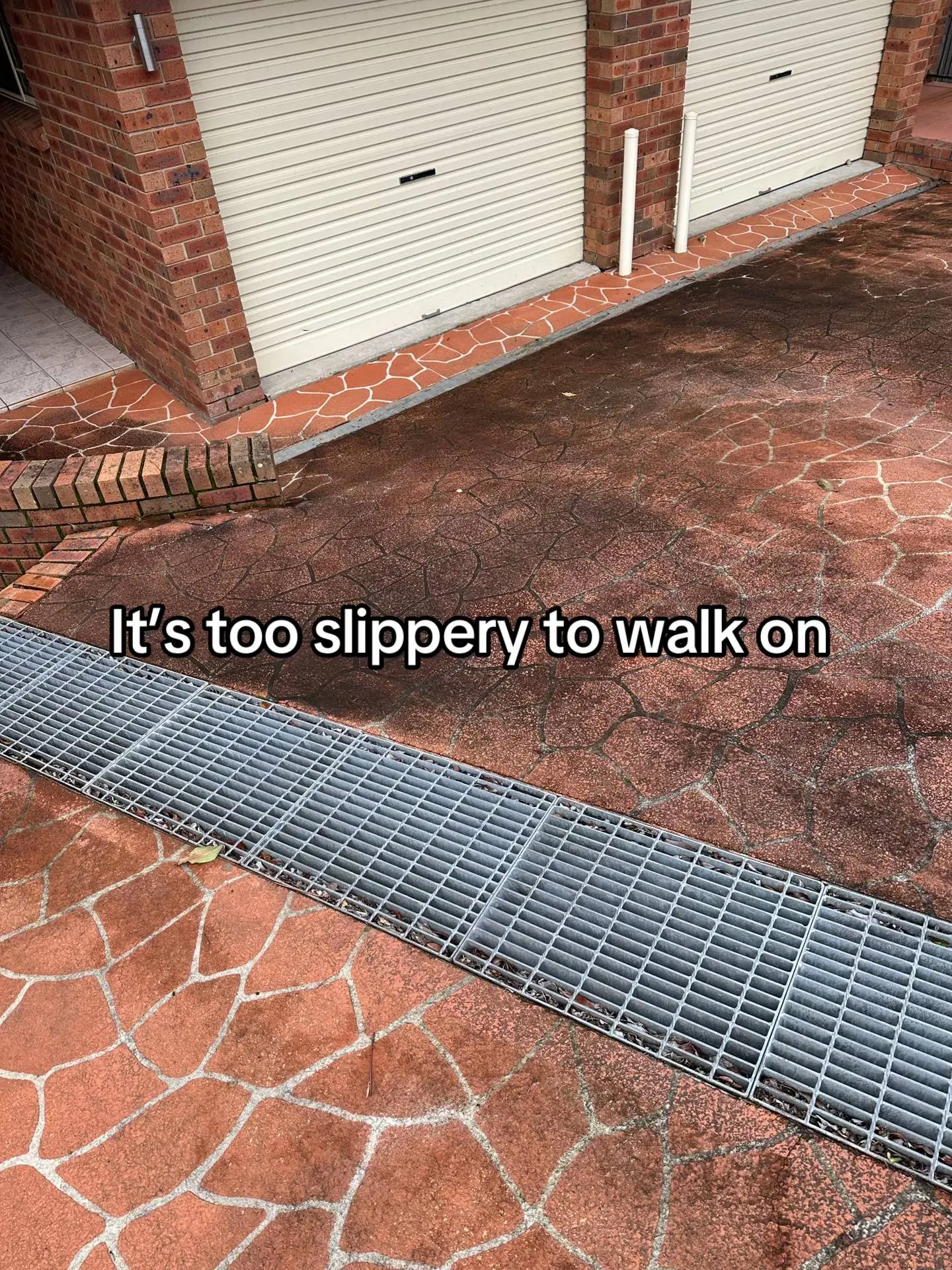 Dirty driveway before pressure washing in Brisbane